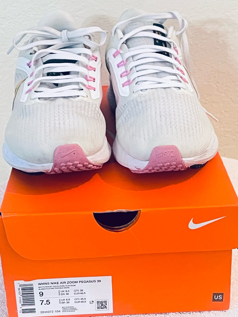 Nike Women's White Sneakers with Pink Accents